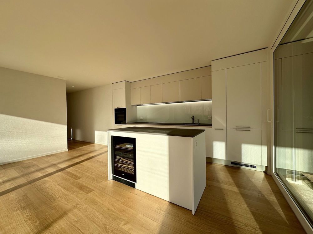 Appartement de haut standing, 3.5 pièces au rez avec jardin - Cuisine et son ilot central