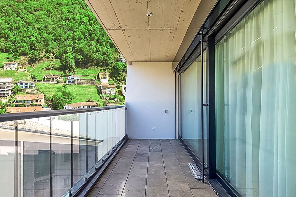 Moderno monolocale con balcone in posizione strategica a Locarno - Bild 1