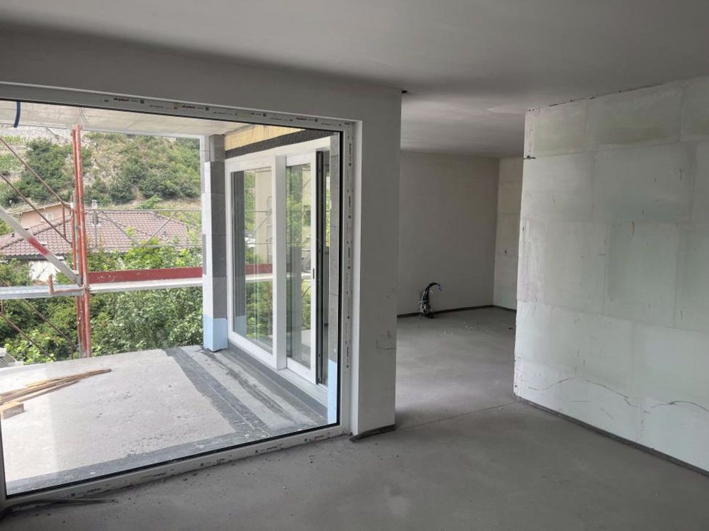 Superbe appartement neuf de 3.5 pièces au dernier étage neuf avec vue panoramique sur les Alpes et le château médiéval - Bild 1