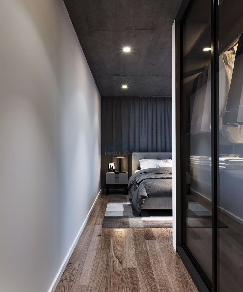 Architektonischer Neubau an idyllischer Wohnlage mit Aussicht - Schlafzimmer mit Ankleide