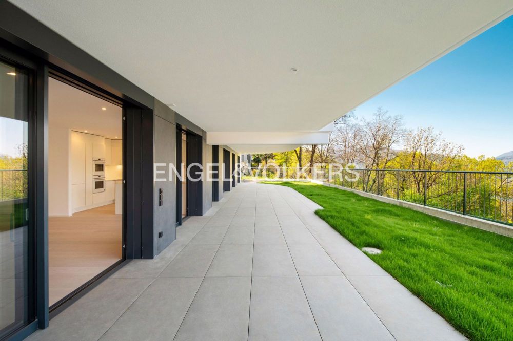Appartamento di nuova costruzione con giardino e vista lago (73) - Bild 13