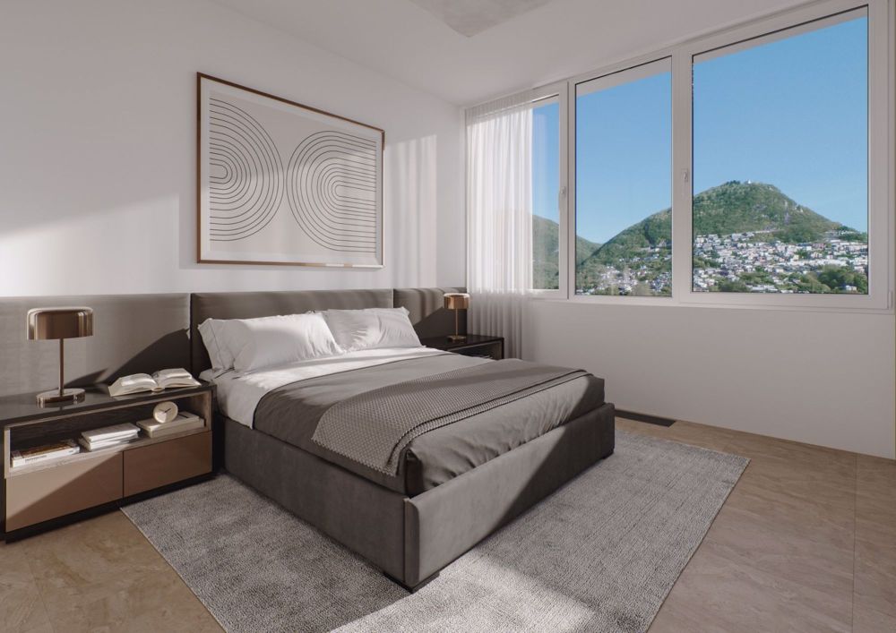 LUGANO - SPAZIOSO ATTICO DI 6.5 LOCALI CON VISTA SULLA CITTA' E SUL LAGO - Bild 4