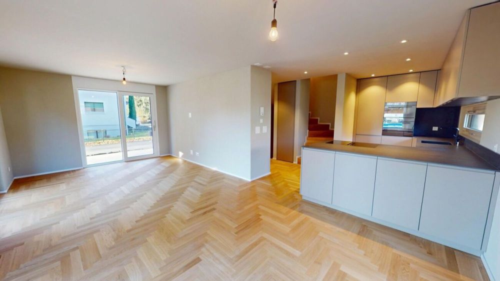 Neubau-Doppeleinfamilienhaus in Buchs SG - Stilvoll wohnen mit Nachhaltigkeit und Komfort - Wohnbereich mit Küche