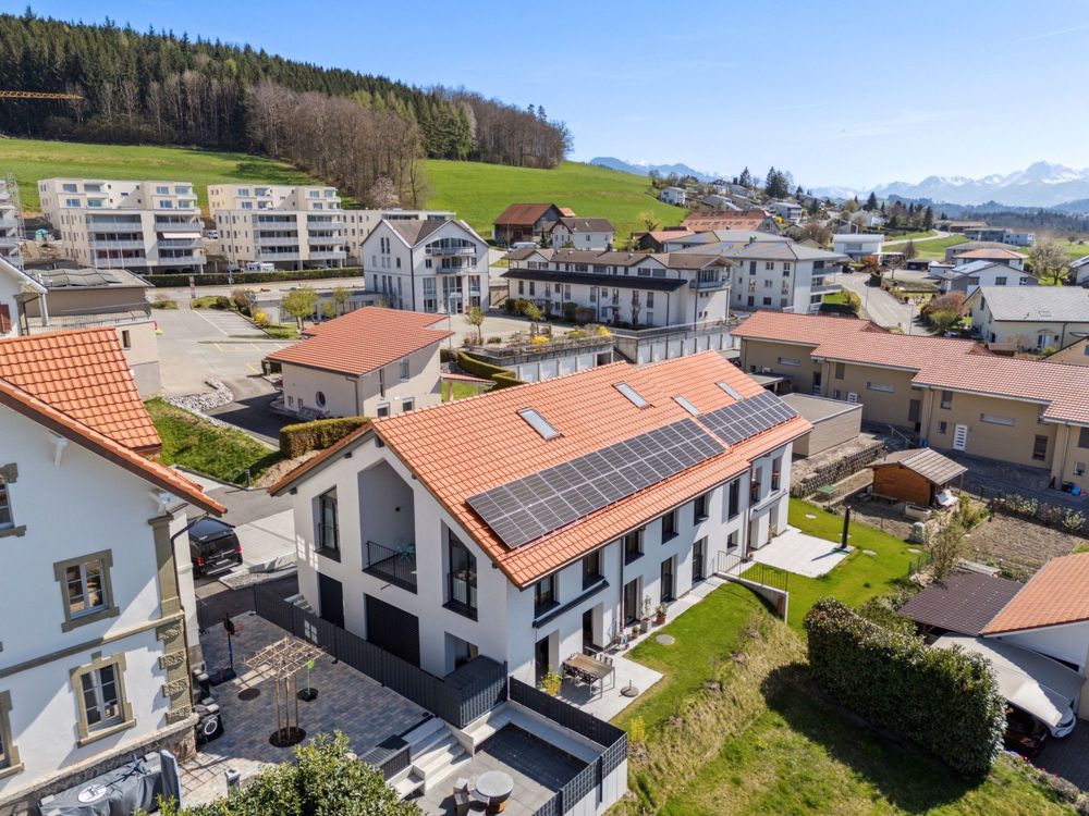 Magnifique appartement neuf avec vue imprenable sur le Jura - L'immeuble / Das Gebäude / The building