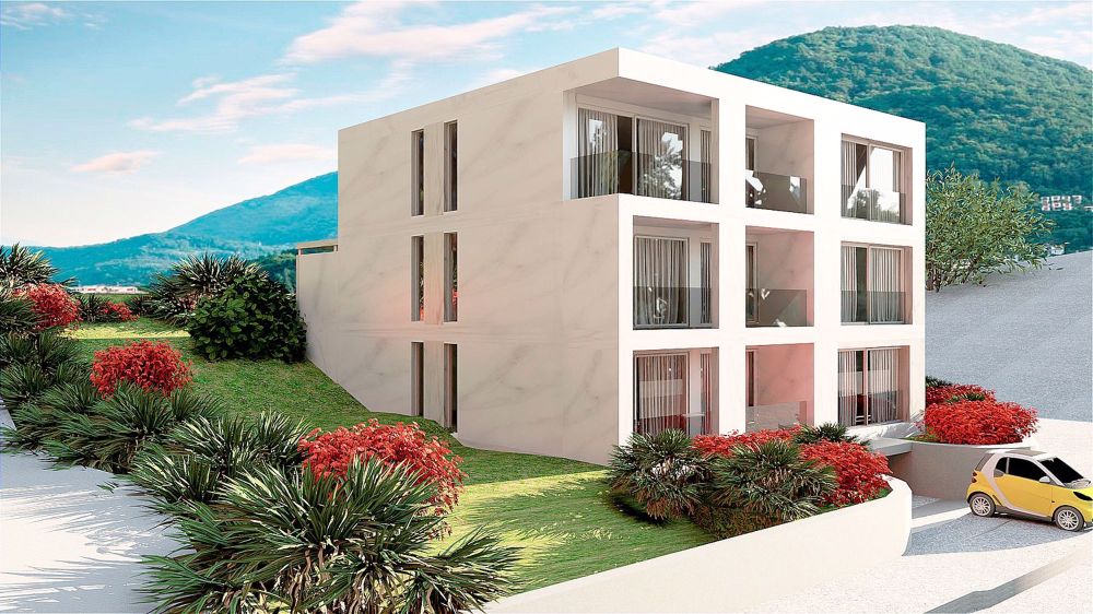 Moderne 2.5-Zimmer-Wohnung mit Panoramablick auf den See in Tresa - Bild 1