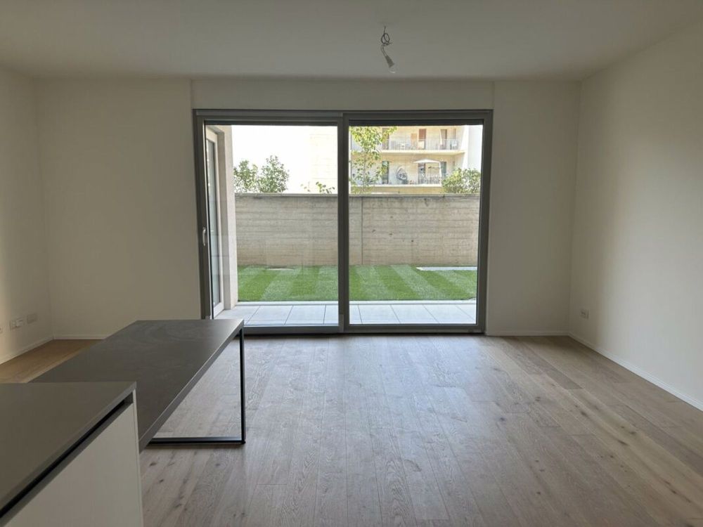 Elegantes Zweizimmerapartment mit privatem Garten in neuem Wohngebäude - Bild 1