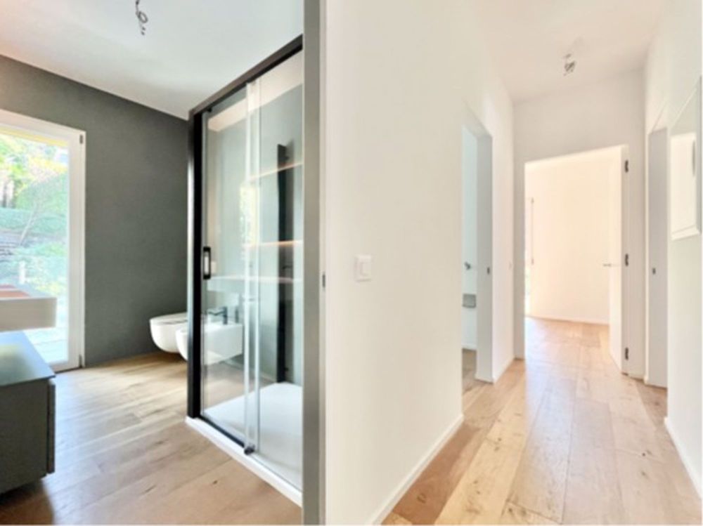 Dachgeschoss 4.5 Zimmer mit Terrassen und Seeblick in Brusino Arsizio - Bild 12