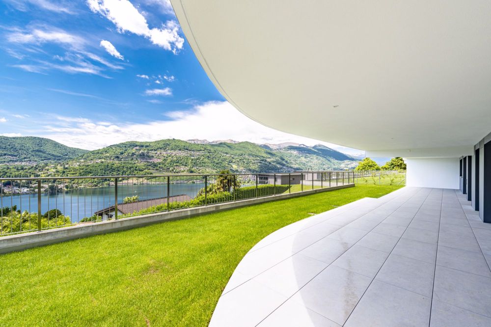 Nuovo appartamento di 4,5 locali in zona prestigiosa con vista lago - Bild 1