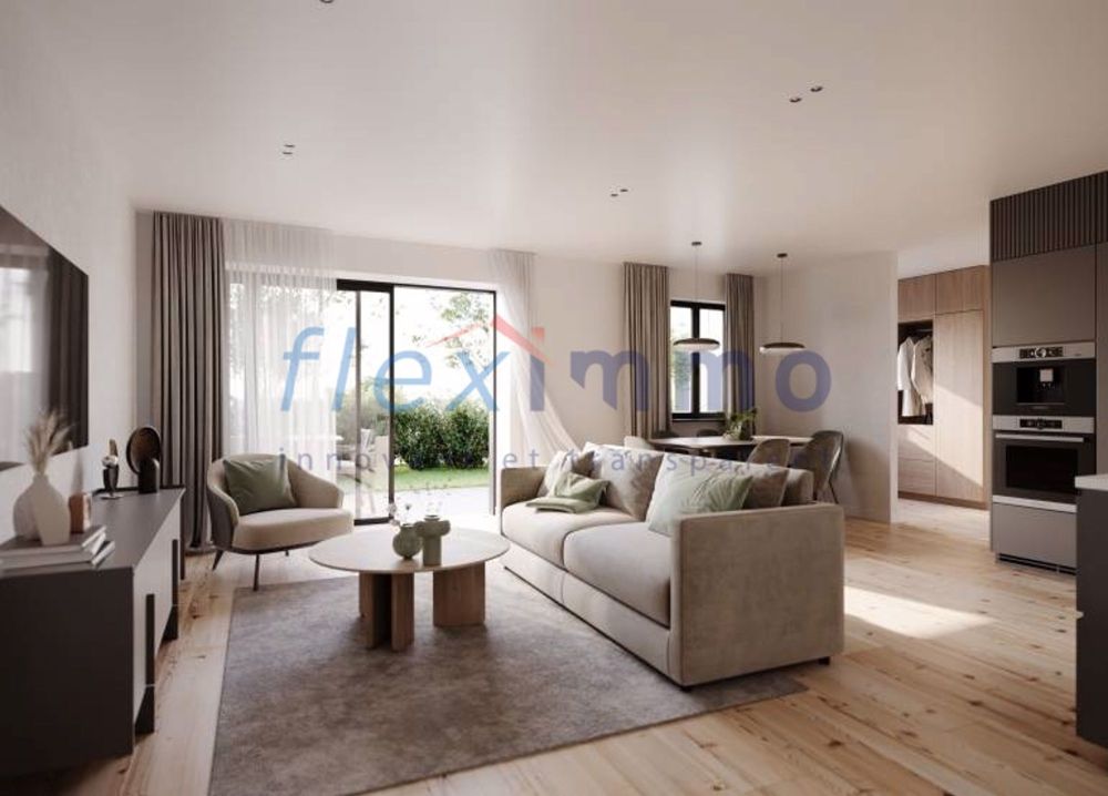 Projet Neuf - Le Paradis des Familles - Image non contractuelle / a living room and kitchen in a modern apartment with large open windows