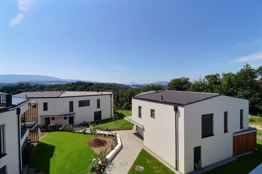 Bel appartement de 4.5 pièces Rooftop / 2 places de parc intérieures - Vue depuis terrasse sur quartier