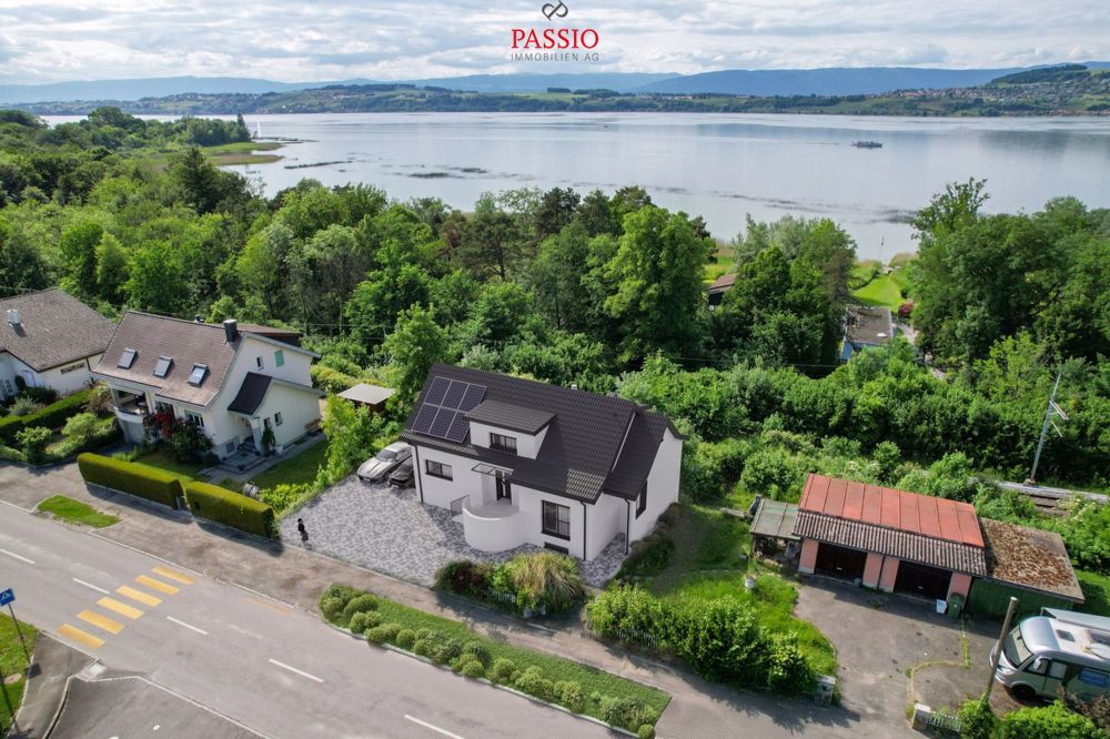 Maison individuelle neuve élégante de 5,5 pièces avec vue sur le lac - Bild 8