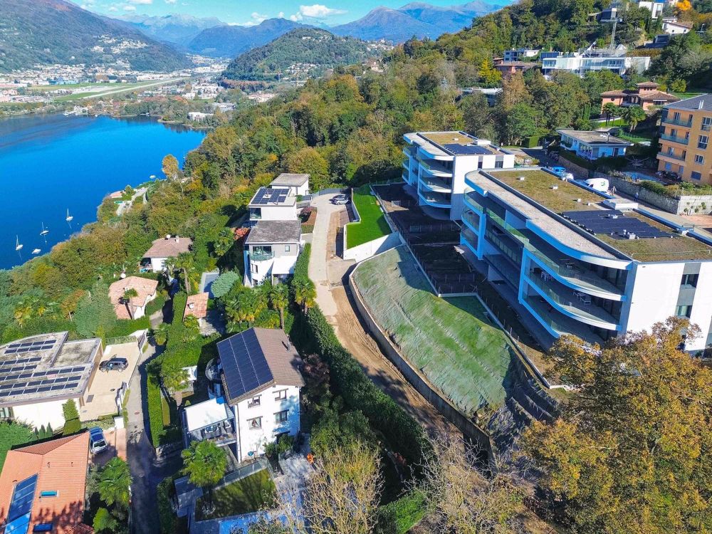 Appartamento con giardino e vista lago a Montagnola in una esclusiva residenza - Bild 3