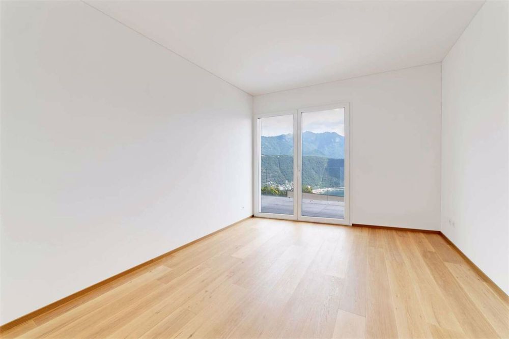 Attico dominante con vista lago a Carona - Bild 9