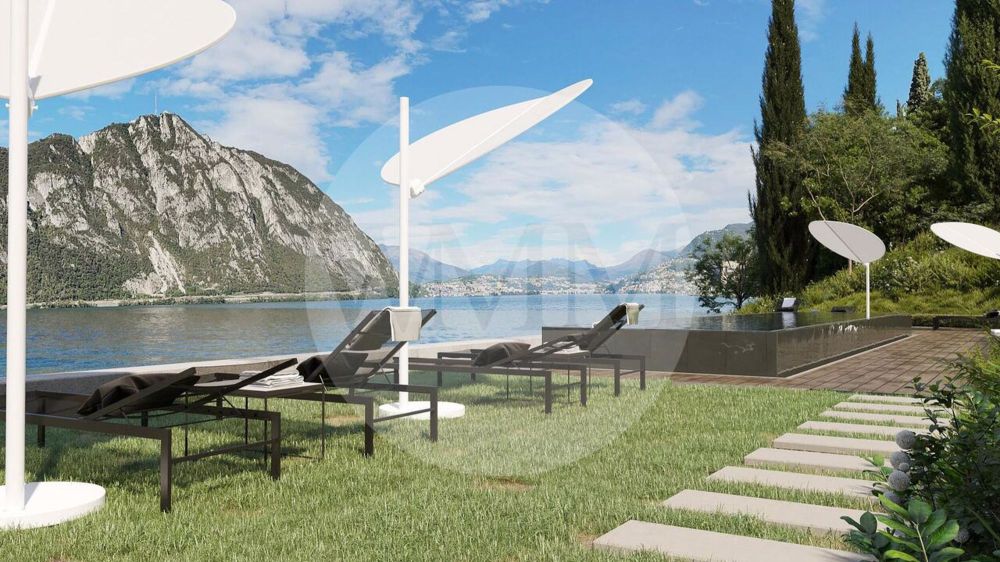 AFFACCIO ESCLUSIVO SUL LAGO: ELEGANTE 5.5 LOCALI CON AMPIA TERRAZZA - Bild 5