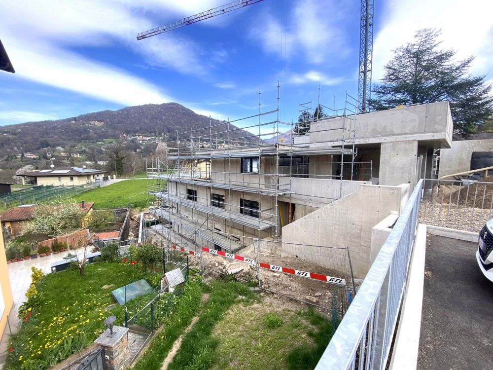 Casa 4,5 locali in costruzione in bifamiliare con giardino privato. - Bild 1