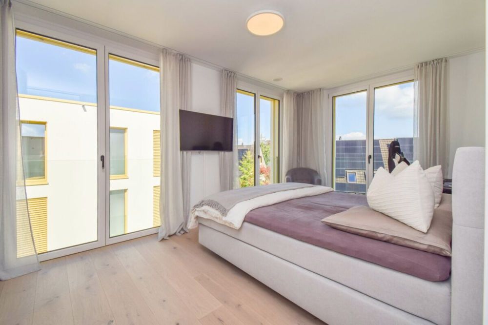 Luxuriöse 4.5-Zimmer-Attikawohnung mit idyllischem Blick ins Grüne - Kinderzimmer