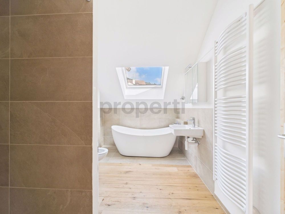 Charmante Neubauwohnung im Dachgeschoss in Grossdietwil modern, ländlich & einzigartig - Bild 9