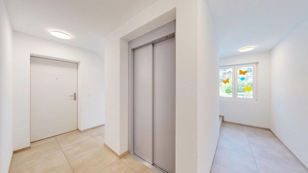 Ländlich leben, gemeinsam wohnen - drei Wohnungen für Generationen - Treppenhaus / Lift