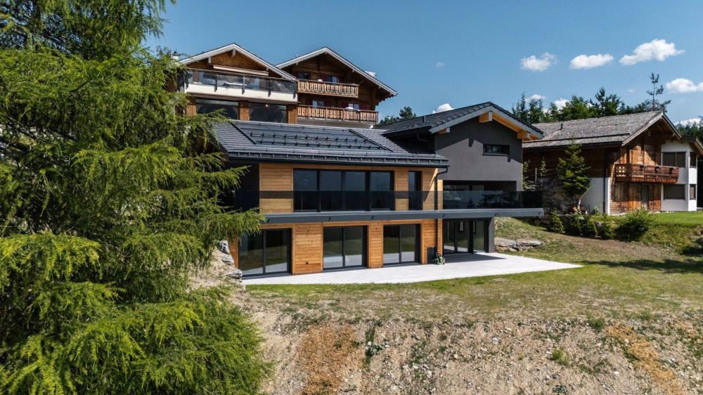 Chalet neuf à Crans-Montana avec vue panoramique - Bild 1
