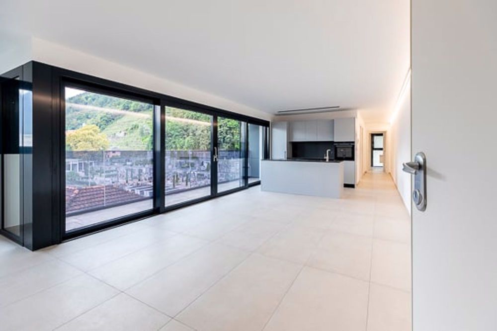 Vivi in Alto Stile: Splendido 3.5 Locali con Terrazza Panoramica a Locarno - Bild 3