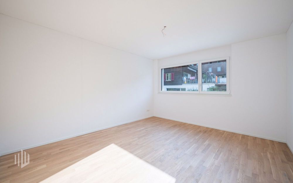 ImmoWyss - Neubauwohnung in Walkringen modernes Wohnen im Grünen - Grosszügiges Schlafzimmer
