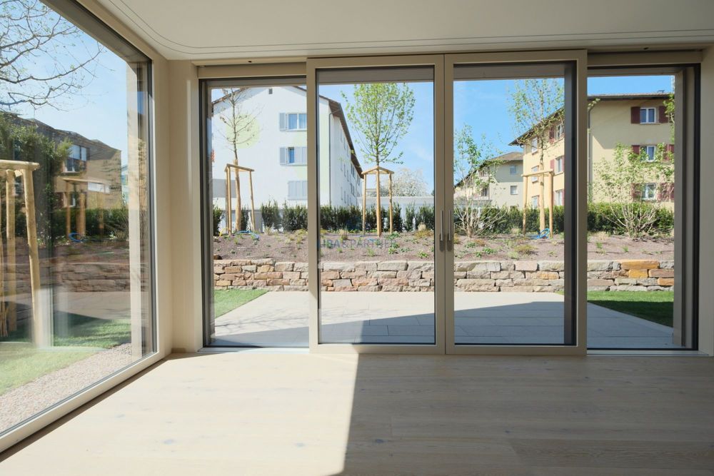 Exklusive Neubauwohnung - 170m² Garten und luxuriöses Wohnambiente - Wintergarten