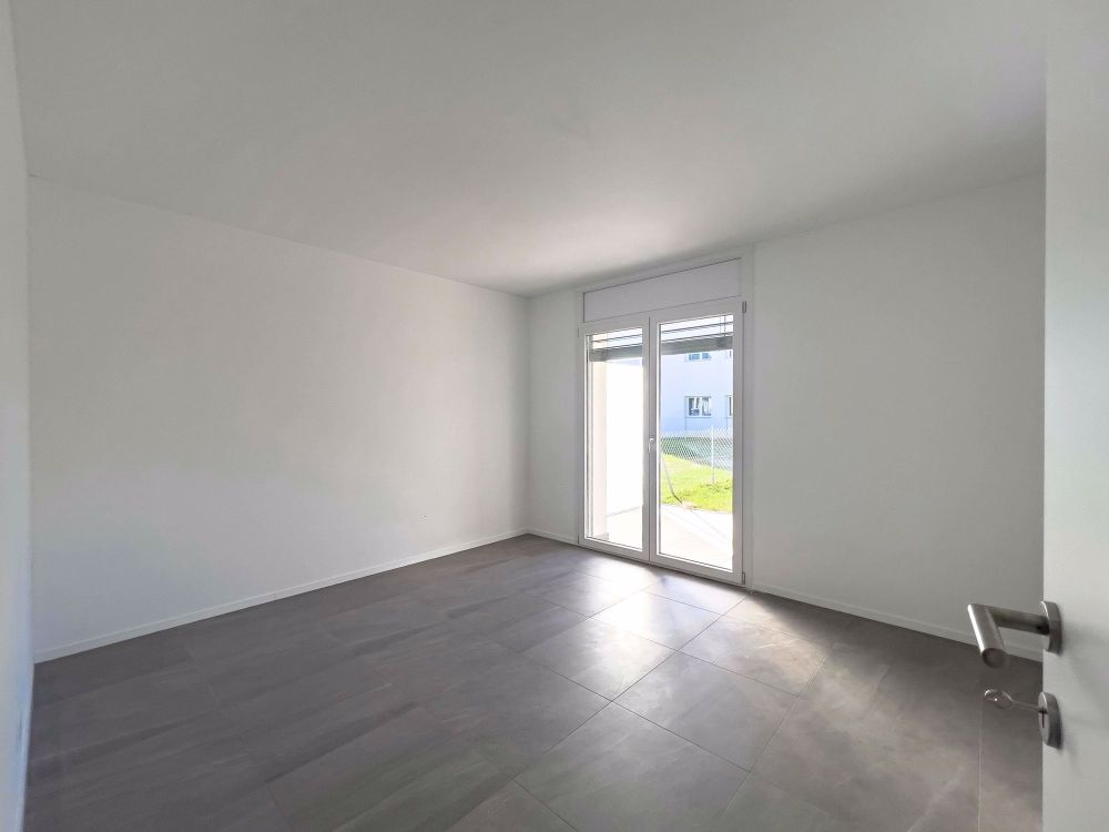 3.5 locali con ampio giardino - Bild 5