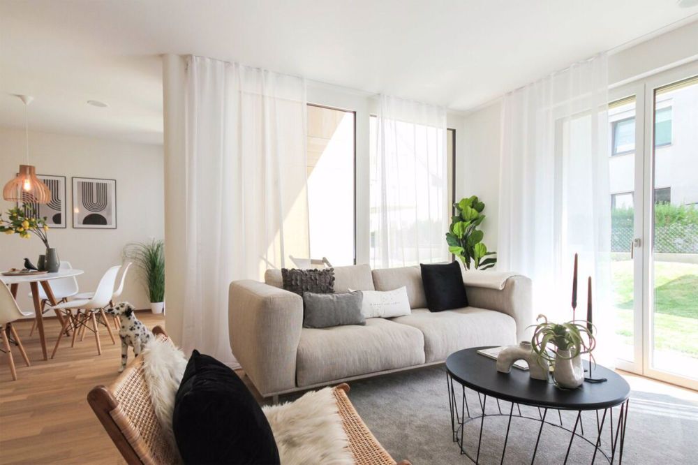 Charmante Maisonettewohnung mit eigenem Garten im Herzen von Reinach - Bild 2
