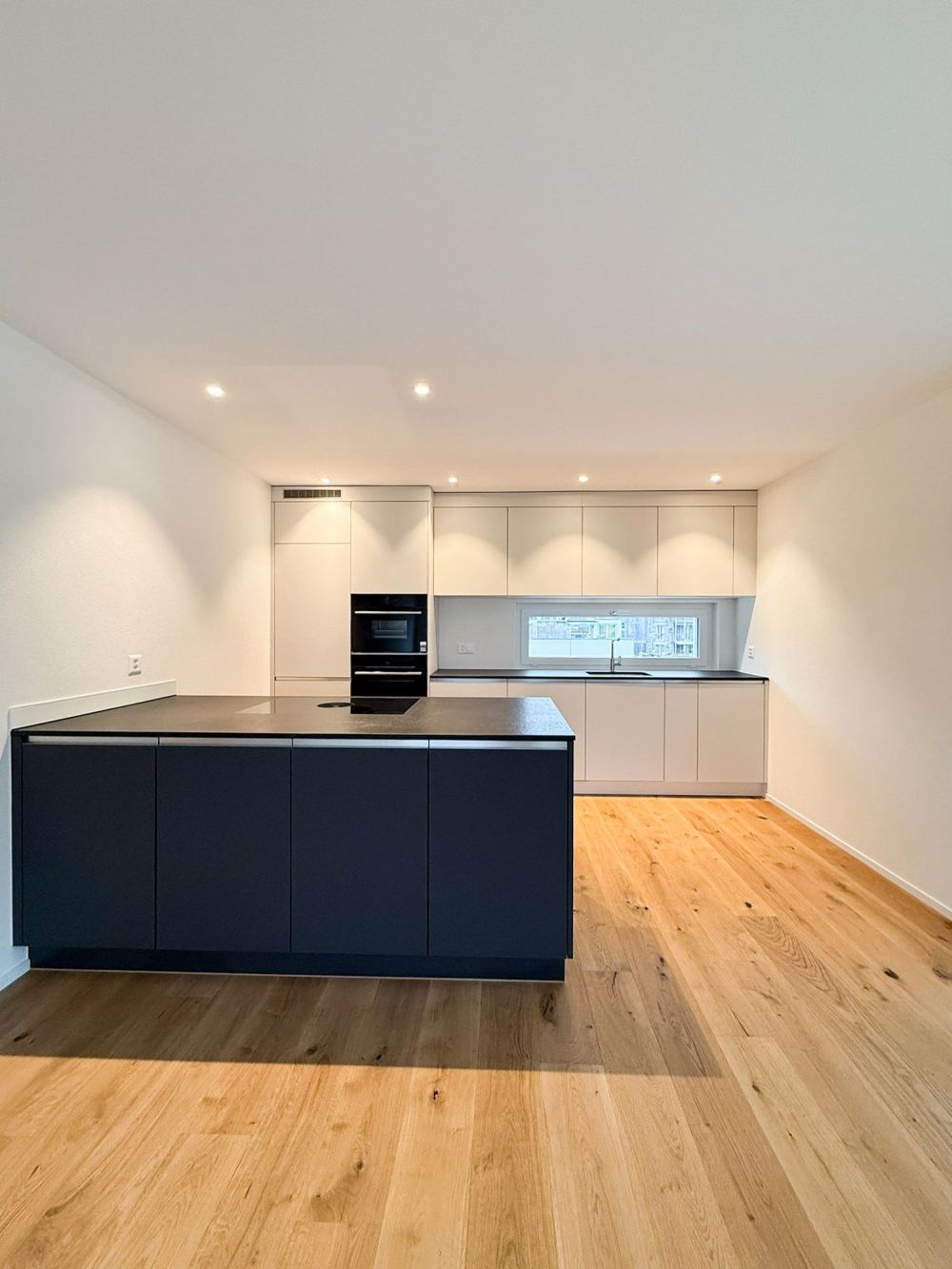 Neubau MFH Flasaa 4.5 ZW - Bild 1
