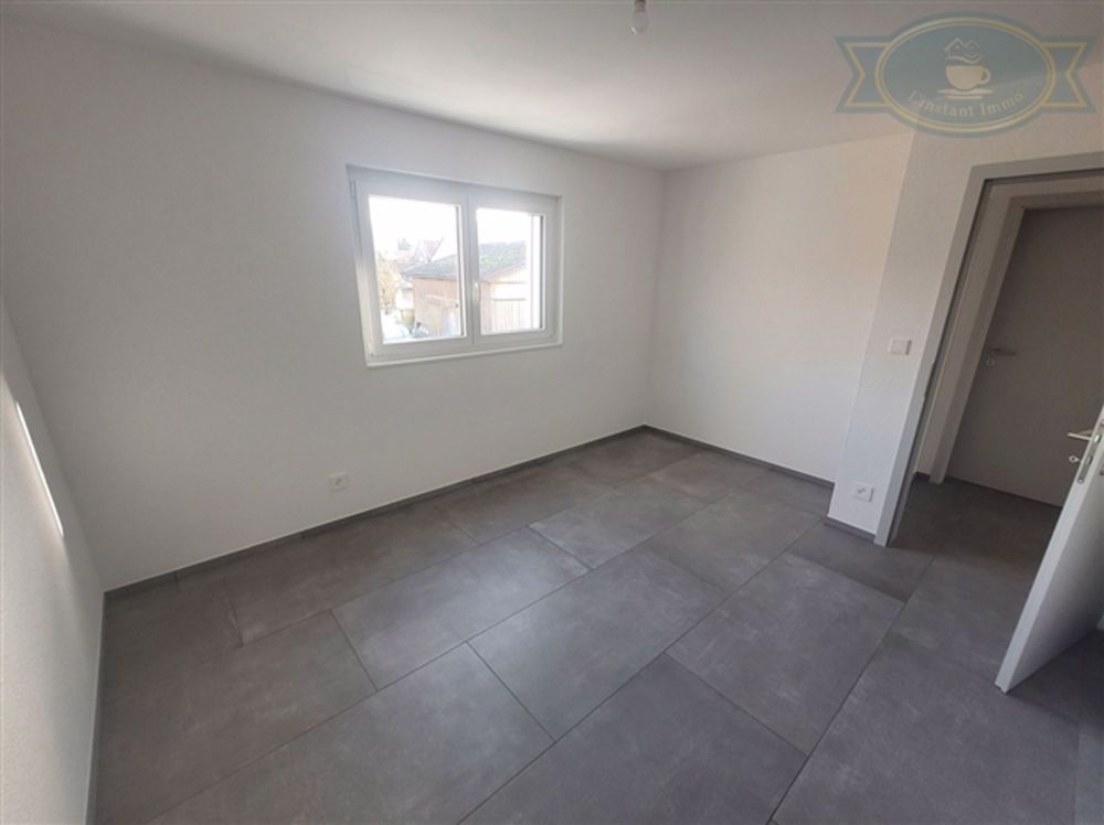Neue Wohnung im Erdgeschoss einer Eigentumswohnung in Vicques - Bild 9