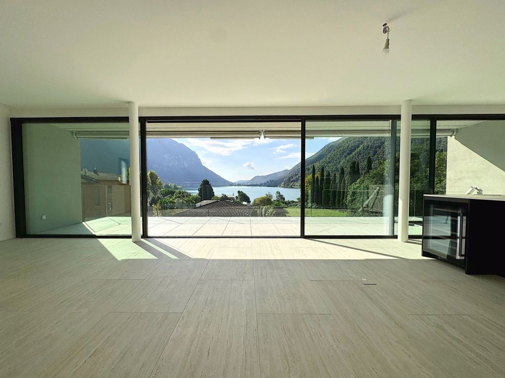 Elegante 4.5 locali al primo piano con terrazza e parziale vista lago - Bild 12
