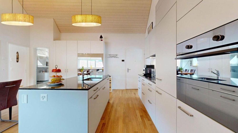 moderne 3.5-Zimmerwohnung mit eigenem Waschturm und Carport - Bild 3