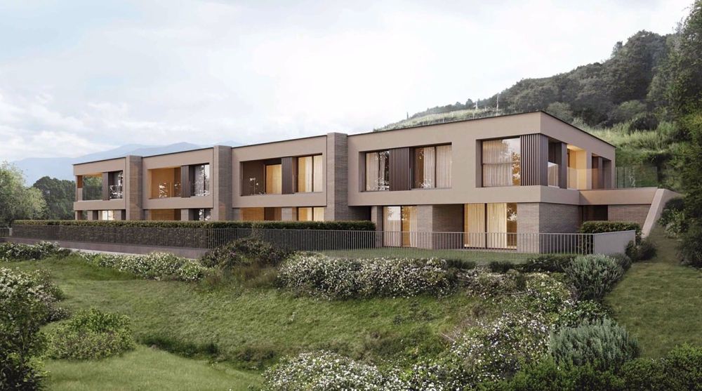 Moderni appartamenti in nuovo complesso residenziale a Comano vista lago - Bild 1
