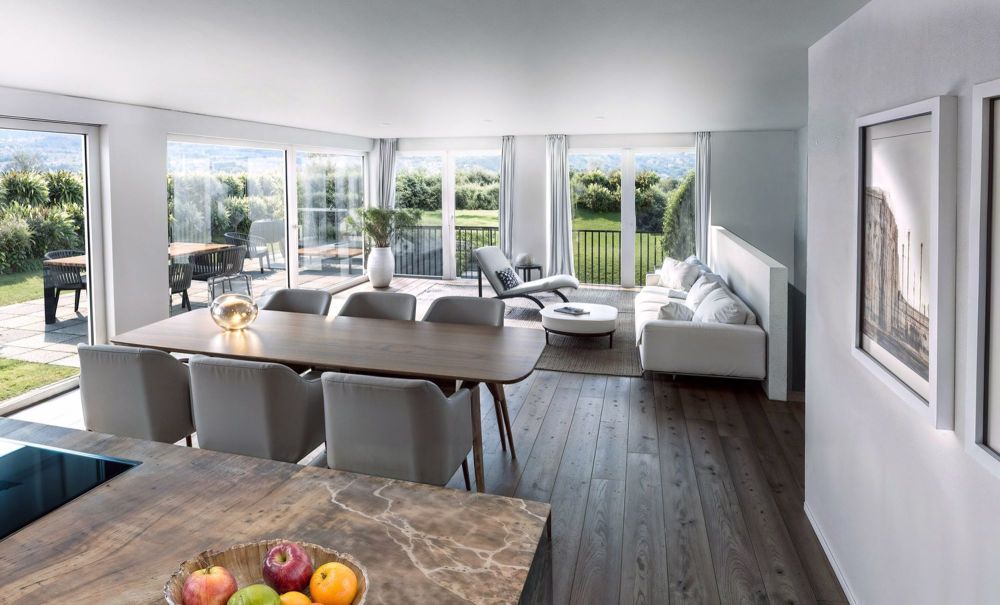 Moderne 4.5-Zimmer-Wohnung mit 330 m2 Gartenanteil - Bild 1
