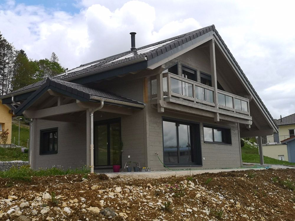 Maison moderne en madrier thermo-chauffé, avec garage, terrasse et jardin - Bild 3