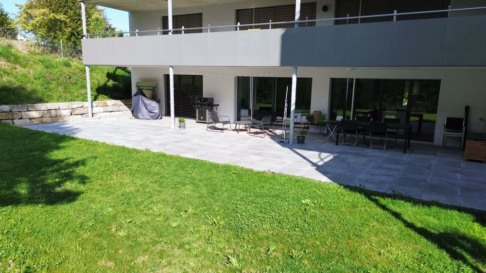 4.5-Zimmer-Gartenwohnung mit 100 m² Terrasse in Düdingen - Bild 6
