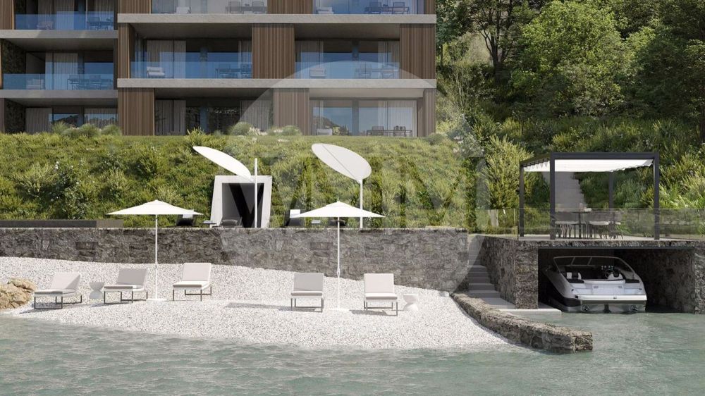 ELEGANTE BILOCALE FRONTE LAGO CON VISTA INCANTEVOLE - Bild 1