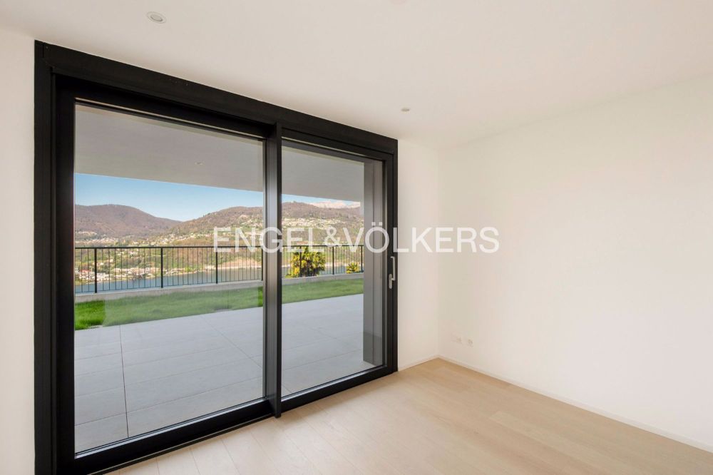 Appartamento di nuova costruzione con giardino e vista lago (73) - Bild 7
