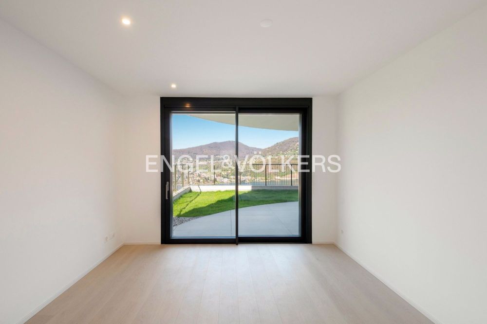 Appartamento di nuova costruzione con giardino e vista lago (73) - Bild 8