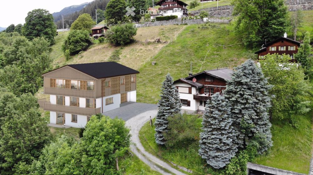 Einfamilienhaus mit Einliegerwohnung und atemberaubendem Bergblick in Serneus - Bild 2