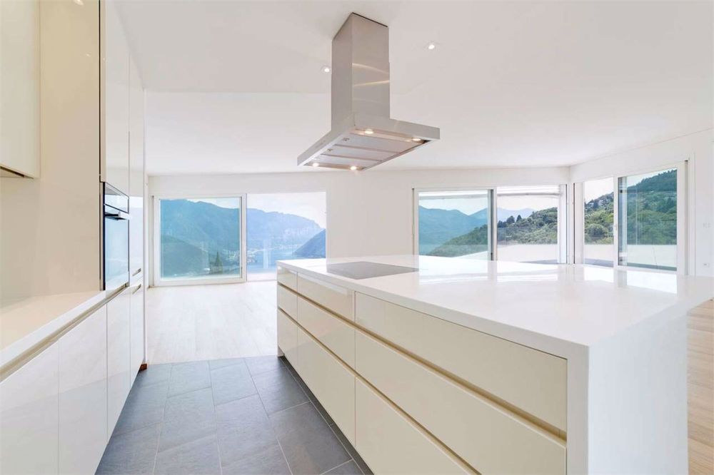 Attico dominante con vista lago a Carona - Bild 2