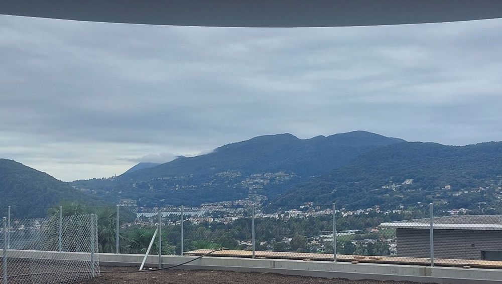 Montagnola: Lussuoso Appartamento con Vista Panoramica e Giardino Privato - Bild 2