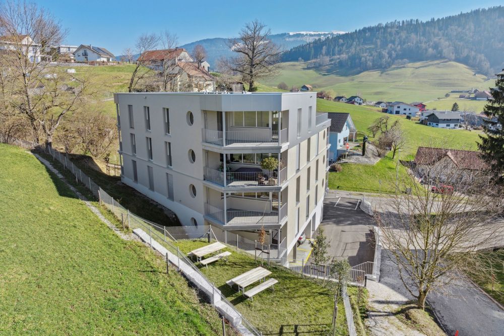 Magnifique appartement neuf au 2ème étage d'une petite PPE - L'immeuble / Das Gebäude / The building