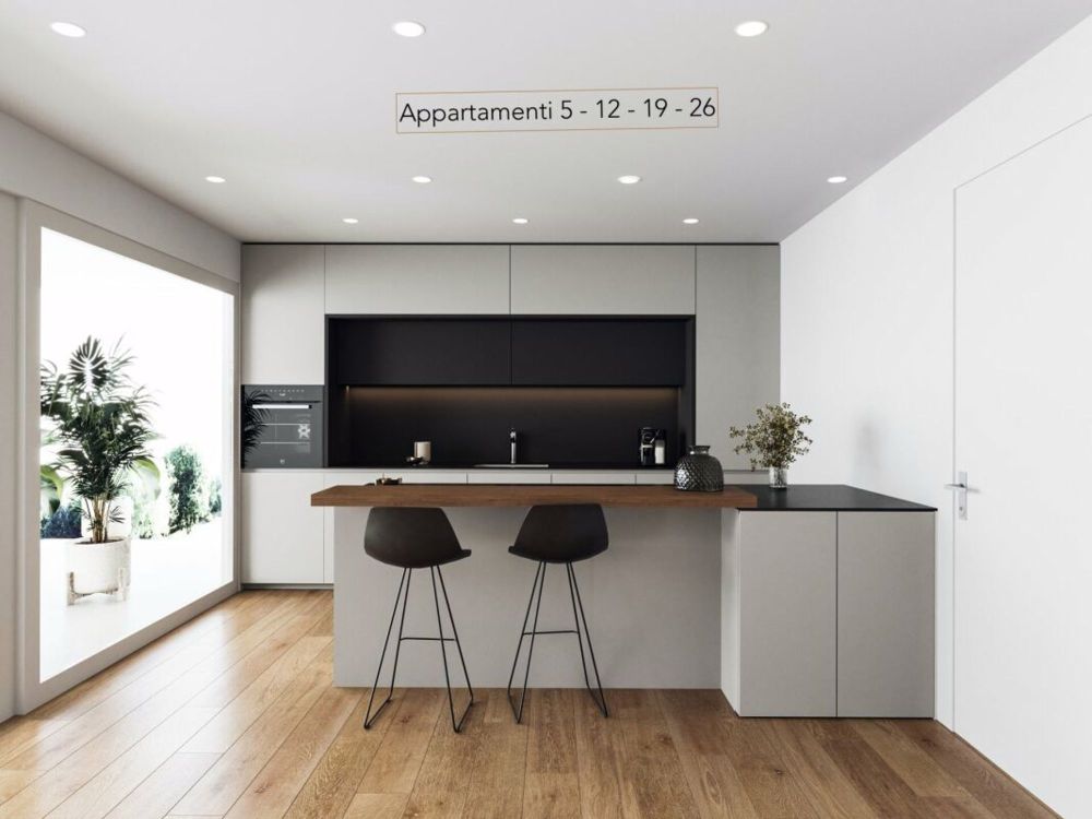 Magnifico 3.5 locali con ampia terrazza in zona tranquilla - Bild 1