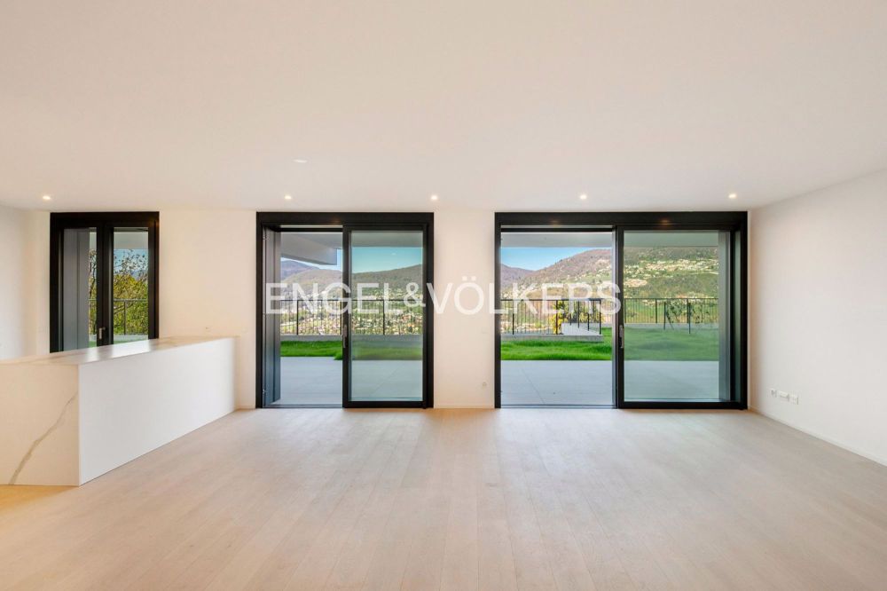 Appartamento di nuova costruzione con giardino e vista lago (73) - Bild 2