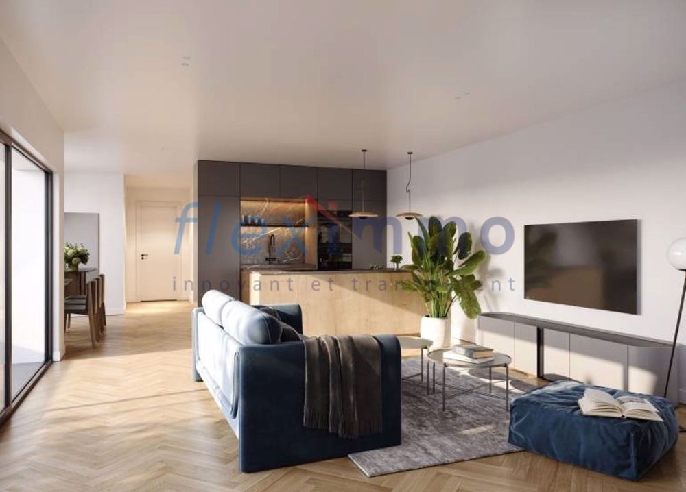 Neues Projekt - Das Paradies für Familien - Image non contractuelle / a modern apartment with hardwood floors, a large living room with a blue couch, a tv, and a table with a plant plant on it