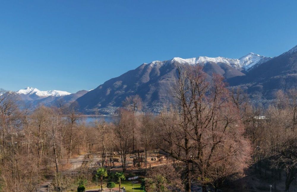 Nuovo attico da sogno a 5 passi dal lago con ampie terrazze e tetto panoramico a Locarno - Bild 13