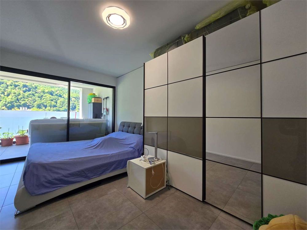 Neue 2.5-Zimmer-Wohnung mit großer Terrasse, eigener Waschküche und Parkplatz - Bild 6