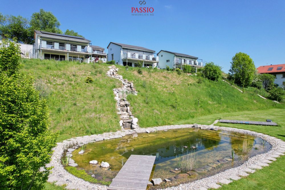 Wohnen mit Weitblick - Neubau-Einfamilienhaus mit Schwimmteichanteil - Bild 1