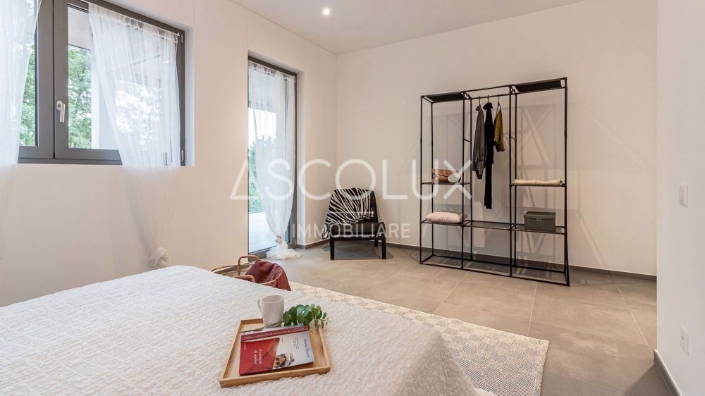 Spazi Moderni e Sereni 4.5 Locali in Residenza Esclusiva ai Confini della Città | Moderne und ruhige Räume 4.5 Zimmer in einer exklusiven Residenz am Stadtrand - pregassona quadri-055-HDR.jpg